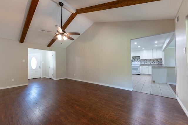 4501 Mink Dr, Haltom City, TX 76117 - unfurnished living room featuring ceiling fan, beamed ceiling, light wood-type flooring, baseboards, and high vaulted ceiling