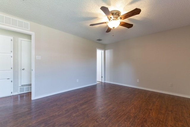 4501 Mink Dr, Haltom City, TX 76117 - empty room with ceiling fan, dark wood-style flooring, baseboards, and a textured ceiling