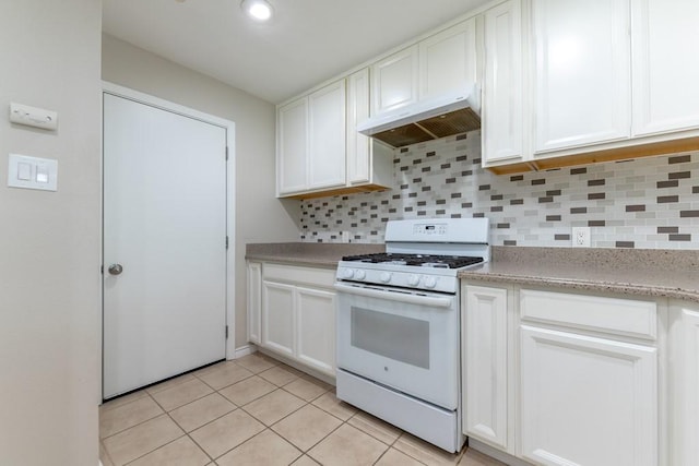 4501 Mink Dr, Haltom City, TX 76117 - kitchen with white range with gas cooktop, under cabinet range hood, decorative backsplash, and white cabinets
