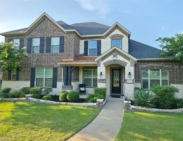 371 Ash Brook Ln, Sunnyvale, TX 75182 - view of front of home with a front lawn, roof with shingles, brick siding, and stone siding