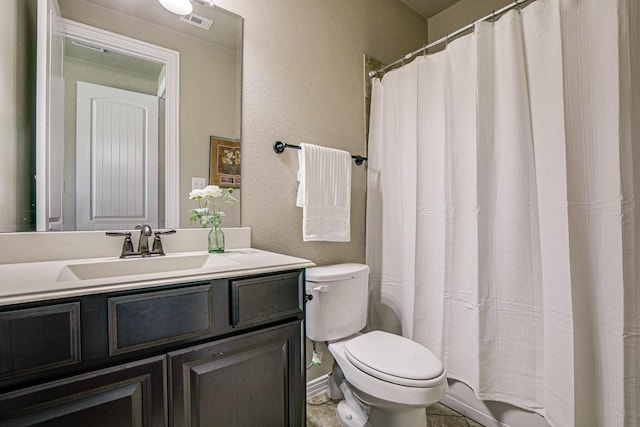 371 Ash Brook Ln, Sunnyvale, TX 75182 - full bathroom with toilet, vanity, a textured wall, and curtained shower