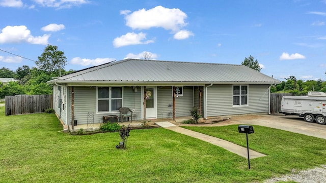239 N 10th St, Jacksboro, TX 76458 - view of front of property with a porch and metal roof