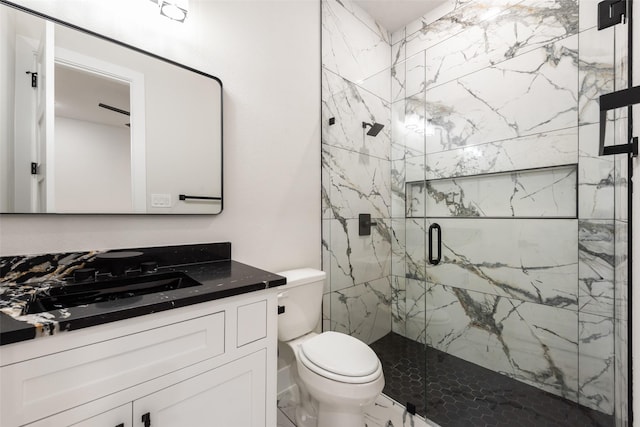 1700 Hamilton Ln, Northlake, TX 76247 - bathroom with toilet, vanity, a marble finish shower, and marble look tiles