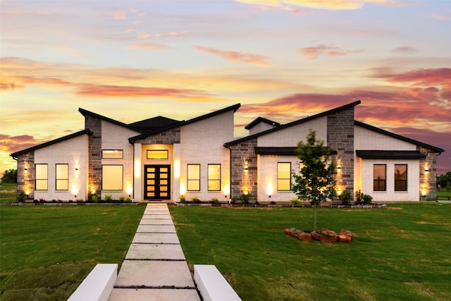 1700 Hamilton Ln, Northlake, TX 76247 - modern home with a front yard, stone siding, brick siding, and french doors