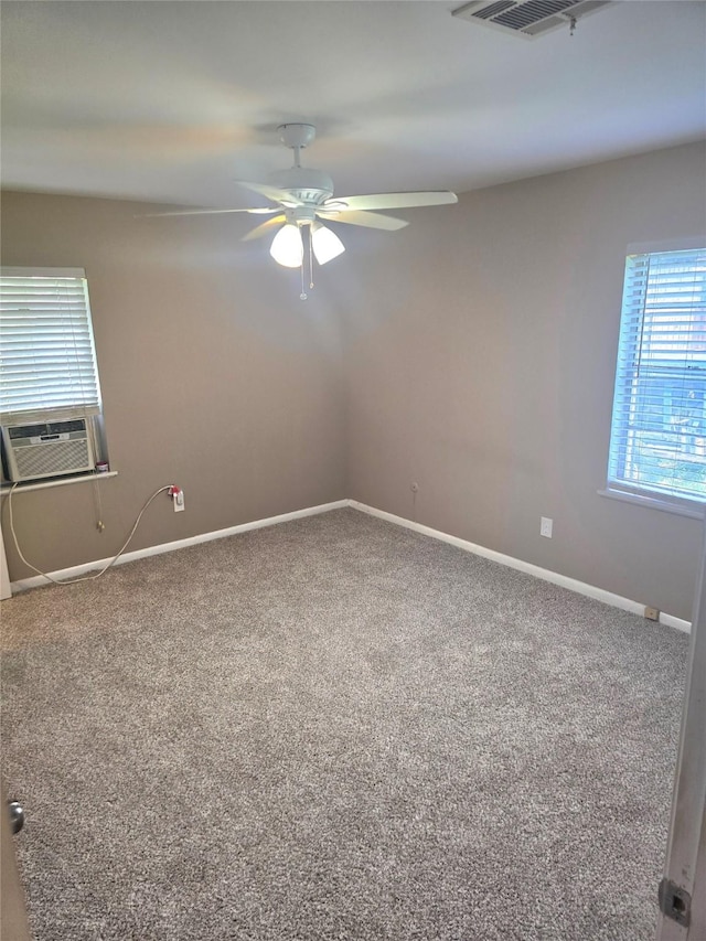 9474 Poinsetta Dr, Shreveport, LA 71118 - carpeted spare room with a ceiling fan, baseboards, and cooling unit