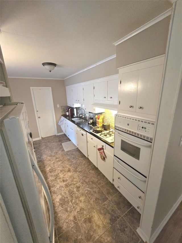9474 Poinsetta Dr, Shreveport, LA 71118 - kitchen featuring white appliances, crown molding, white cabinets, dark countertops, and tasteful backsplash