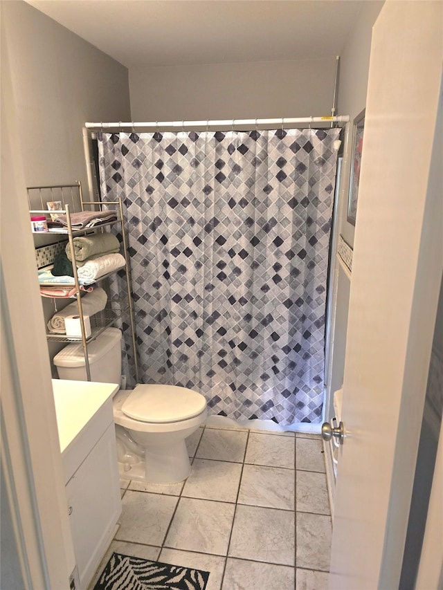 9474 Poinsetta Dr, Shreveport, LA 71118 - full bathroom with vanity, a shower stall, tile patterned floors, and toilet
