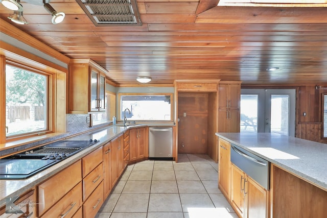 920 SW 3rd St, Hamlin, TX 79520 - kitchen featuring a warming drawer, dishwasher, wood ceiling, a sink, and healthy amount of natural light