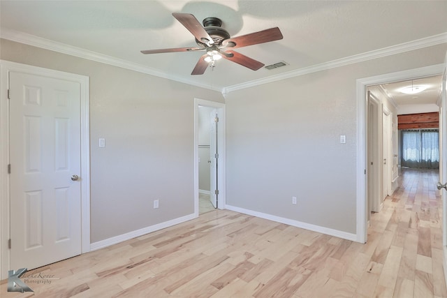 920 SW 3rd St, Hamlin, TX 79520 - unfurnished bedroom with light wood-style flooring, ornamental molding, baseboards, and a ceiling fan