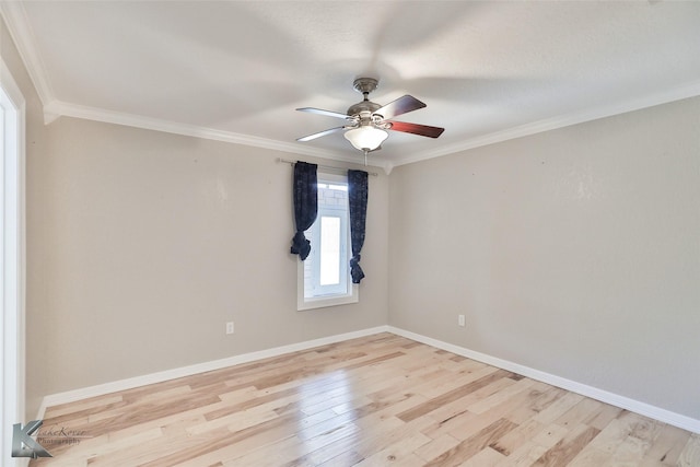 920 SW 3rd St, Hamlin, TX 79520 - spare room with ceiling fan, light wood-style floors, crown molding, and baseboards