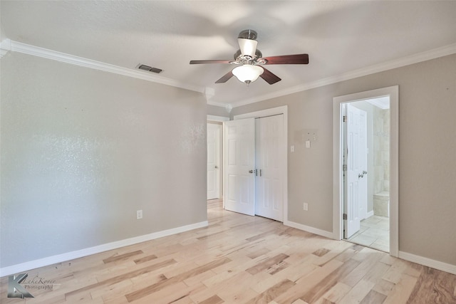 920 SW 3rd St, Hamlin, TX 79520 - unfurnished bedroom with light wood-type flooring, ornamental molding, baseboards, ensuite bathroom, and a ceiling fan