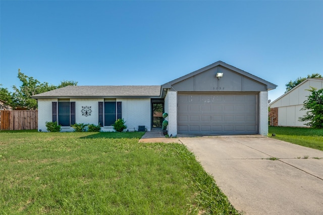 3232 Bunker Hill Dr, Forest Hill, TX 76140 - single story home with brick siding, concrete driveway, and an attached garage