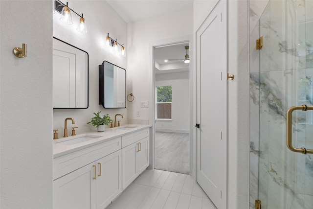5634 Barkridge Dr, Granbury, TX 76048 - full bath with double vanity, a marble finish shower, a ceiling fan, and tile patterned floors