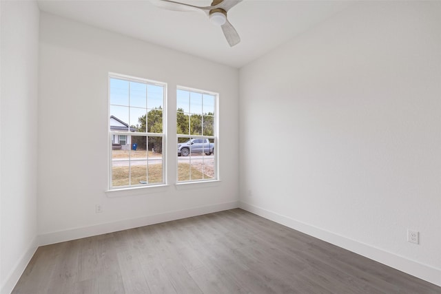 5634 Barkridge Dr, Granbury, TX 76048 - empty room featuring wood finished floors, baseboards, and a ceiling fan