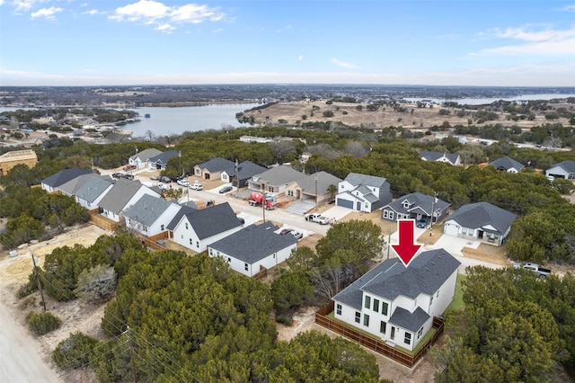 5634 Barkridge Dr, Granbury, TX 76048 - aerial perspective of suburban area with a nearby body of water