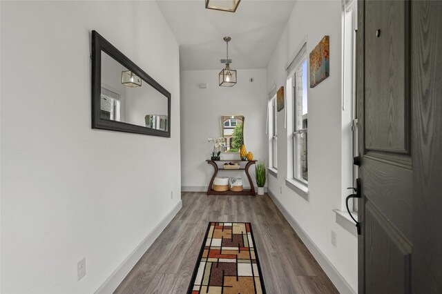 12947 Cabana Dr, Frisco, TX 75035 - corridor with wood finished floors and baseboards