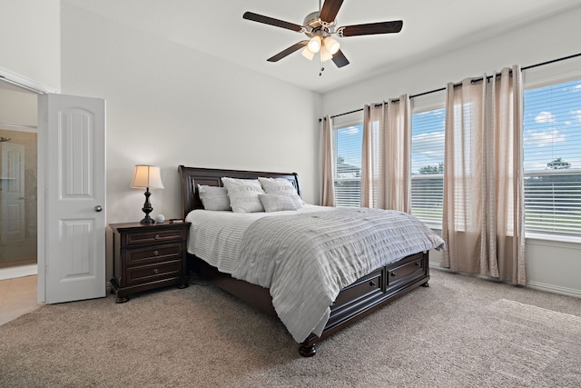 1052 Winecup Ln, Weatherford, TX 76085 - bedroom featuring multiple windows, light carpet, and ceiling fan
