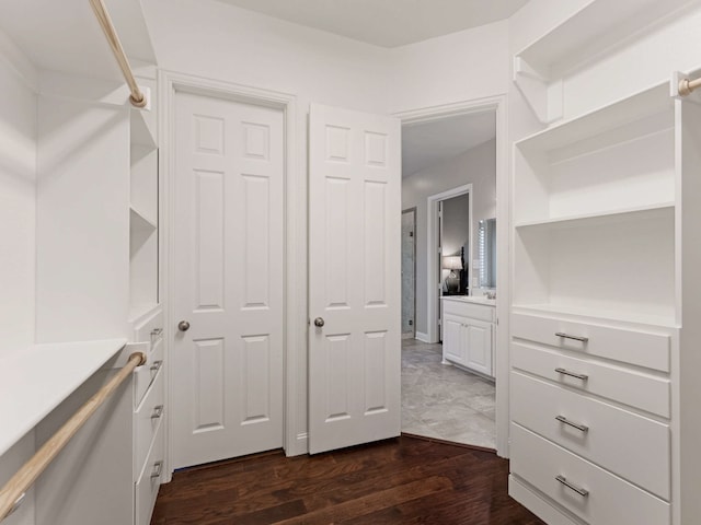 1025 Arches Park Dr, Allen, TX 75013 - walk in closet featuring dark wood-style floors