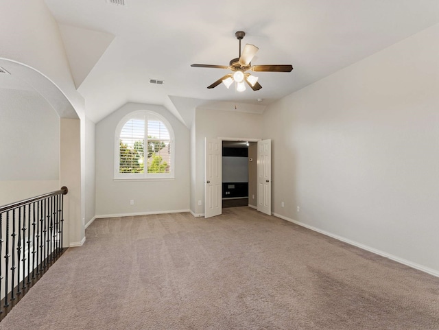 1025 Arches Park Dr, Allen, TX 75013 - carpeted spare room with a ceiling fan, lofted ceiling, and baseboards