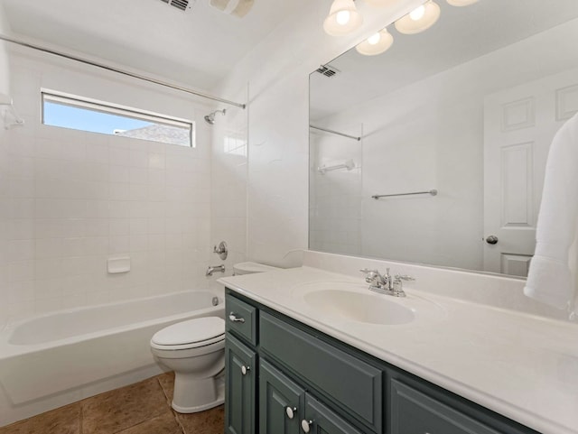 1025 Arches Park Dr, Allen, TX 75013 - bathroom with vanity, toilet, washtub / shower combination, and tile patterned floors