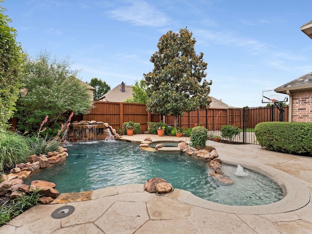1025 Arches Park Dr, Allen, TX 75013 - view of swimming pool with a fenced backyard and a pool with connected hot tub