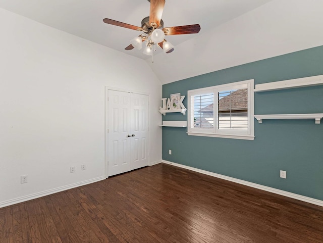 1025 Arches Park Dr, Allen, TX 75013 - unfurnished bedroom with vaulted ceiling, wood finished floors, baseboards, a ceiling fan, and a closet