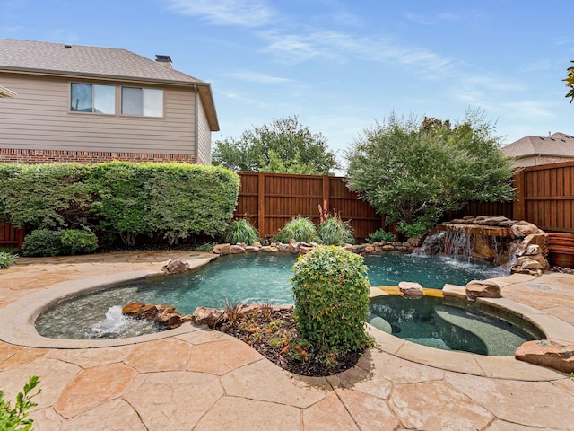 1025 Arches Park Dr, Allen, TX 75013 - view of swimming pool with a fenced backyard and a pool with connected hot tub