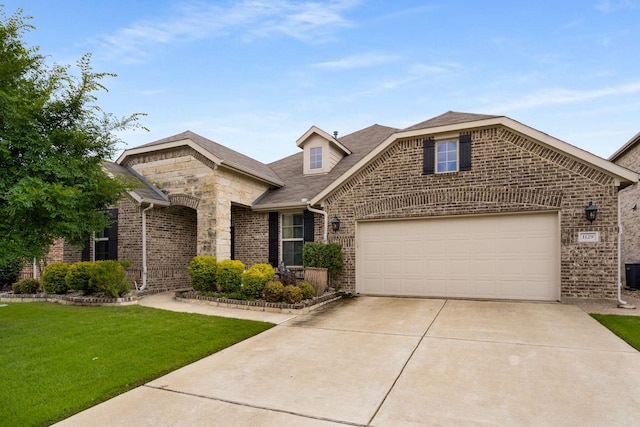 1129 Mesa Crest Dr, Fort Worth, TX 76052 - view of front facade with brick siding, concrete driveway, a front lawn, central air condition unit, and an attached garage