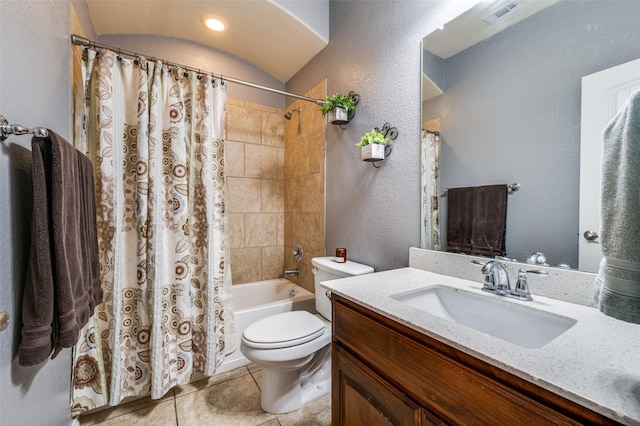 5825 Loveland Dr, Denton, TX 76208 - bathroom featuring vanity, toilet, shower / bath combination with curtain, tile patterned flooring, and a textured wall