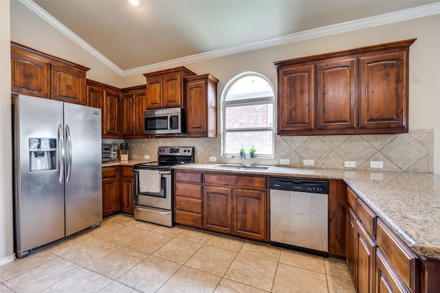 5825 Loveland Dr, Denton, TX 76208 - kitchen featuring stainless steel appliances, a sink, crown molding, backsplash, and light tile patterned flooring