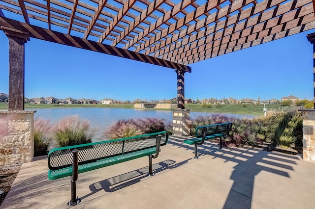2113 Rubin Rd, Fate, TX 75189 - view of patio featuring a water view, a pergola, and a residential view