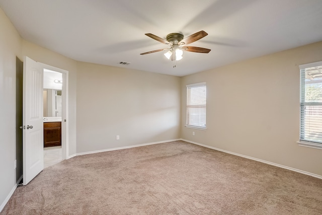 2113 Rubin Rd, Fate, TX 75189 - empty room with light colored carpet, ceiling fan, and baseboards