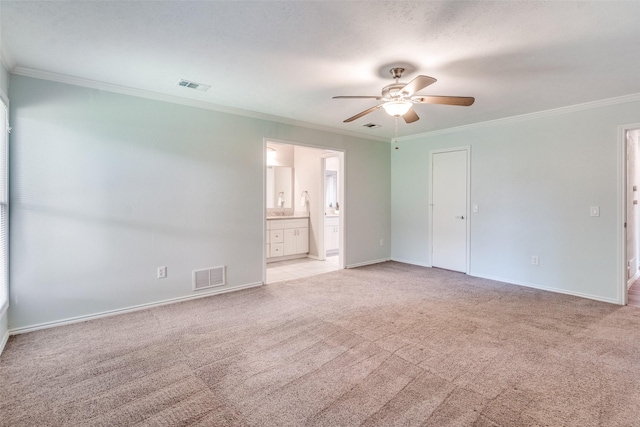 2309 Merrimac Dr, Plano, TX 75075 - unfurnished bedroom with ornamental molding, light colored carpet, baseboards, connected bathroom, and ceiling fan