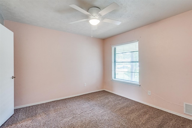 2309 Merrimac Dr, Plano, TX 75075 - carpeted spare room with ceiling fan and baseboards