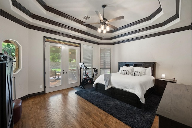 1205 Platte Dr, Mansfield, TX 76063 - bedroom with ornamental molding, a raised ceiling, access to outside, french doors, and wood finished floors