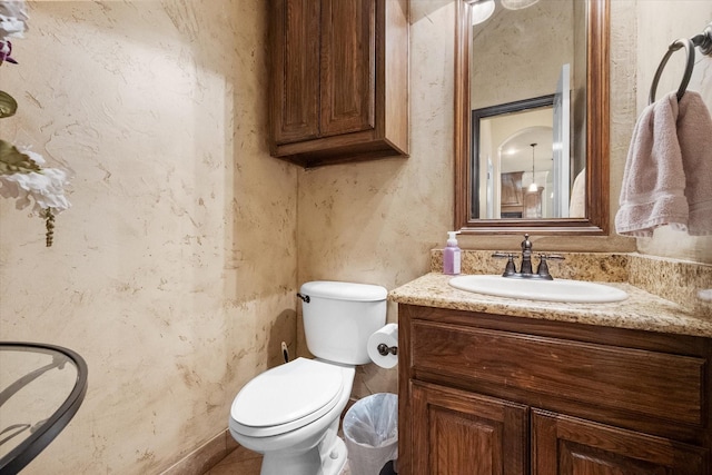 1205 Platte Dr, Mansfield, TX 76063 - half bathroom featuring vanity and toilet