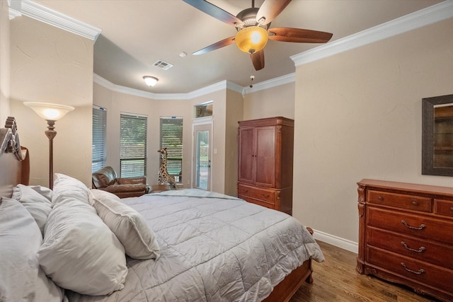 1205 Platte Dr, Mansfield, TX 76063 - bedroom with wood finished floors, crown molding, baseboards, and a ceiling fan
