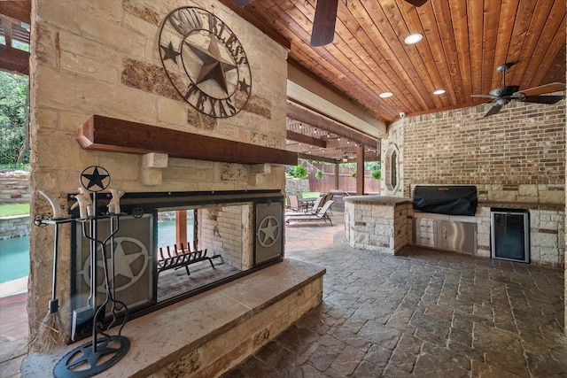 1205 Platte Dr, Mansfield, TX 76063 - view of patio with a ceiling fan and a multi sided fireplace