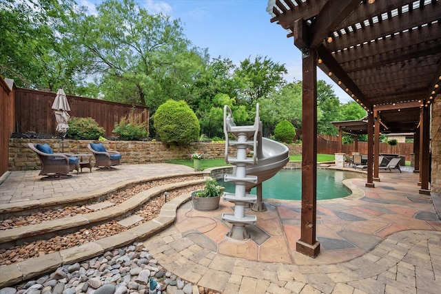 1205 Platte Dr, Mansfield, TX 76063 - fenced backyard featuring a pergola, a patio, and view of wooded area