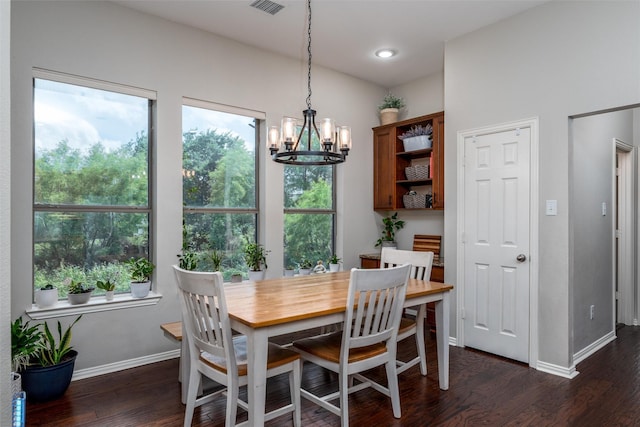 3400 Eisenhower Ave, Melissa, TX 75454 - dining room with baseboards, healthy amount of natural light, a chandelier, and dark wood finished floors