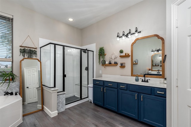 3400 Eisenhower Ave, Melissa, TX 75454 - full bathroom with wood finished floors, vanity, a stall shower, and a bath