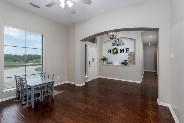 3400 Eisenhower Ave, Melissa, TX 75454 - dining room with arched walkways, wood finished floors, ceiling fan, and baseboards