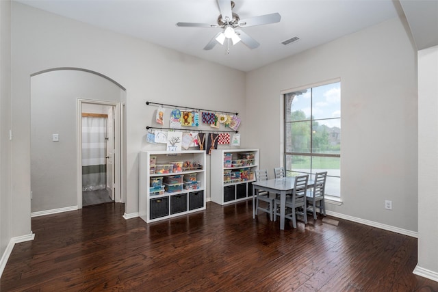 3400 Eisenhower Ave, Melissa, TX 75454 - dining area with wood finished floors, a ceiling fan, baseboards, and arched walkways