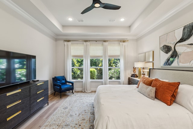 32 Katie Ln, Trophy Club, TX 76262 - bedroom featuring a tray ceiling, light wood-type flooring, a ceiling fan, and baseboards