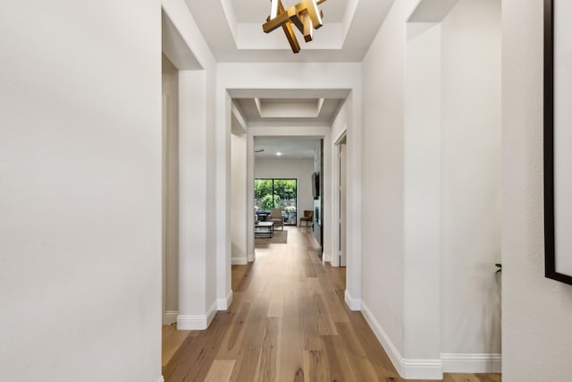 32 Katie Ln, Trophy Club, TX 76262 - corridor with a tray ceiling, light wood-type flooring, and baseboards