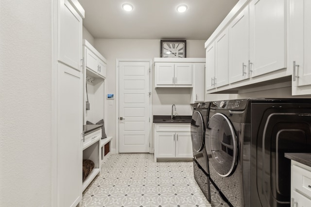 32 Katie Ln, Trophy Club, TX 76262 - laundry area with independent washer and dryer, cabinet space, and recessed lighting