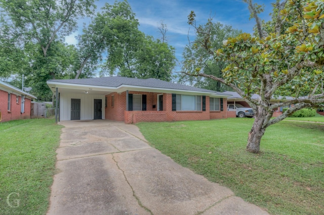 732 Camilla Dr, Shreveport, LA 71104 - single story home with driveway, a front yard, and brick siding