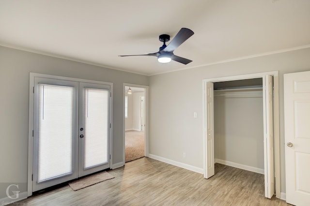 732 Camilla Dr, Shreveport, LA 71104 - unfurnished bedroom featuring french doors, light wood-type flooring, baseboards, crown molding, and a ceiling fan