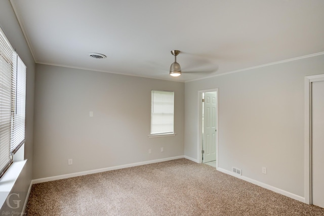 732 Camilla Dr, Shreveport, LA 71104 - empty room featuring ornamental molding, carpet floors, ceiling fan, and baseboards