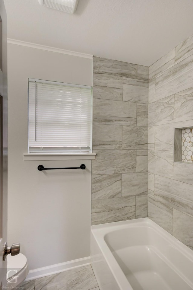 732 Camilla Dr, Shreveport, LA 71104 - bathroom with toilet, baseboards, ornamental molding, and washtub / shower combination